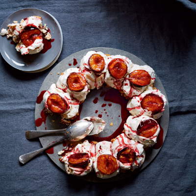 hazelnut-meringue-wreath-with-roasted-plums-recipe-waitrose