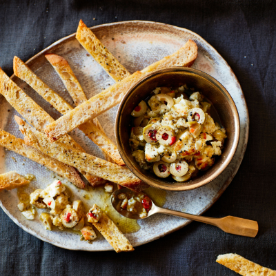 baked-feta-dip-with-olives-truffle-and-artichoke
