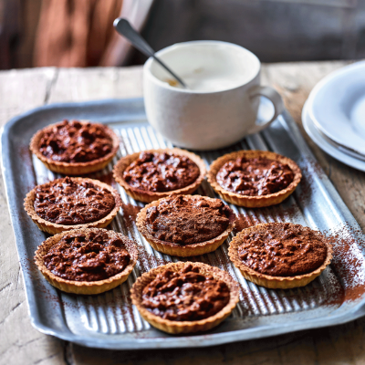 chocolate-pecan-pies-with-maple-cream-recipe-waitrose
