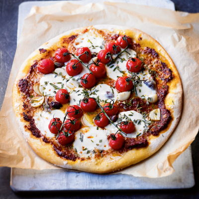 pizza-with-mozzarella-rosemary-roasted-tomatoes-black-olives