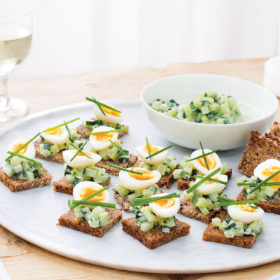 quails-eggs-and-pickled-cucumber-on-rye