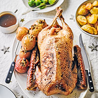 slow-roast-goose-with-honey-calvados-stuffed-apples