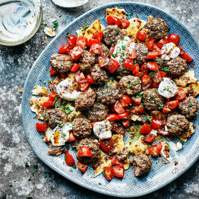 spiced-koftas-with-grilled-flatbread-and-tomato-zaatar-dressing