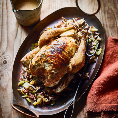 tarragon-garlic-butter-roasted-chicken-on-leeks-and-celery